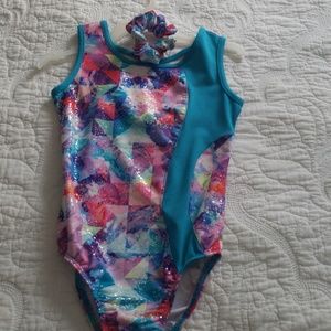 Gymnastics leotard with scrunchie bow